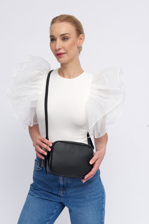 Bolso de bandolera piel con pompón Cristin Primavera Negro