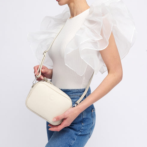 Bolso de bandolera piel con pompón Cristin Primavera Beige