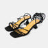 Sandalias con tacón de piel con tiras trenzadas para mujer negro Gabriella