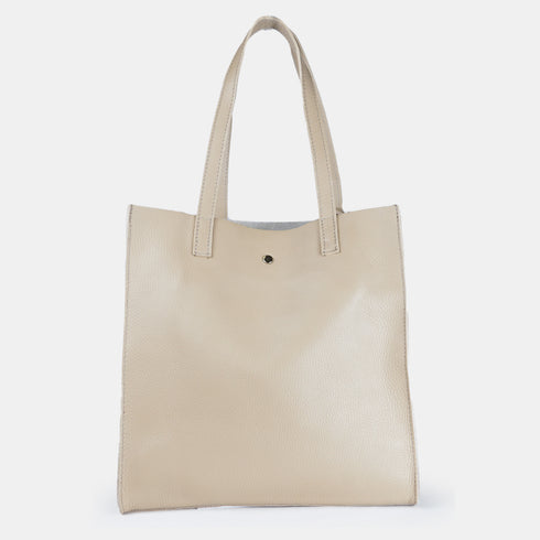 Bolso estilo tote bag para mujer de color kahki con piel genuina de calidad en vista frontal.